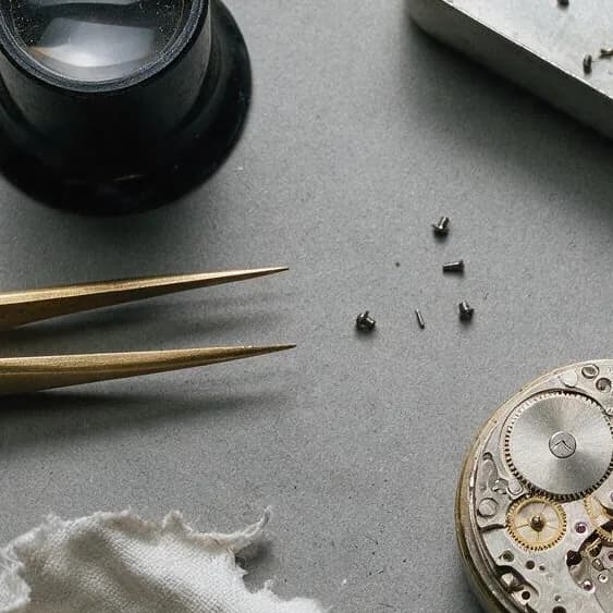 Seedream 5.0 Pro at 1K: centre crop of a watchmaker's bench flat lay